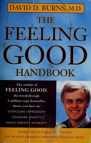 The Feeling Good Handbook by David D. Burns, MD — Plume revised edition cover, with the title in white block letters on a yellow band.
